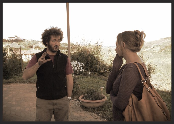 Luca and Erin w/ Cisterna d'Asti in the background